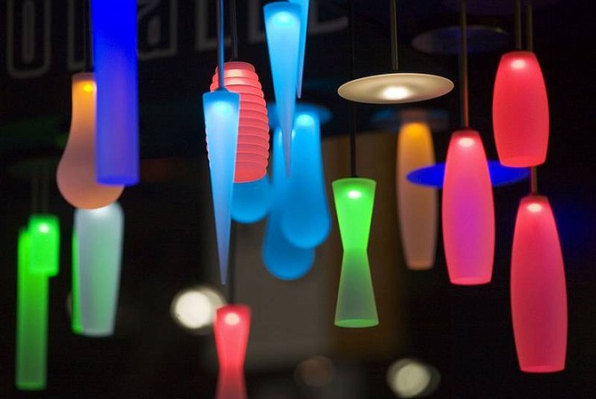 Mark Lennihan/Associated Press Colored lamps, illuminated by LEDs, are displayed by Winona Lighting at the Lightfair International trade show May 8 in New York.
