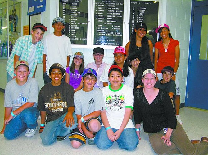 Participants in the Dayton Intermediate school Hats on Day fundraiser are, back row from left: Derek Jakubowski, 13; Moises Vega, 13, Bre Russell, 11; Erica McKusick, 14; Magda Landa, 13; Lorena Sanchez, 14; Kathie Arias, 13; Ericka Garcia, 14 and Joey Lescher, 14. Front row from left: Tim Taylor, 11; Adolfo Espinosa, 14; Nicky Selmi, 12; Pedro Duenas, 13 and teacher Ali Cadwell.