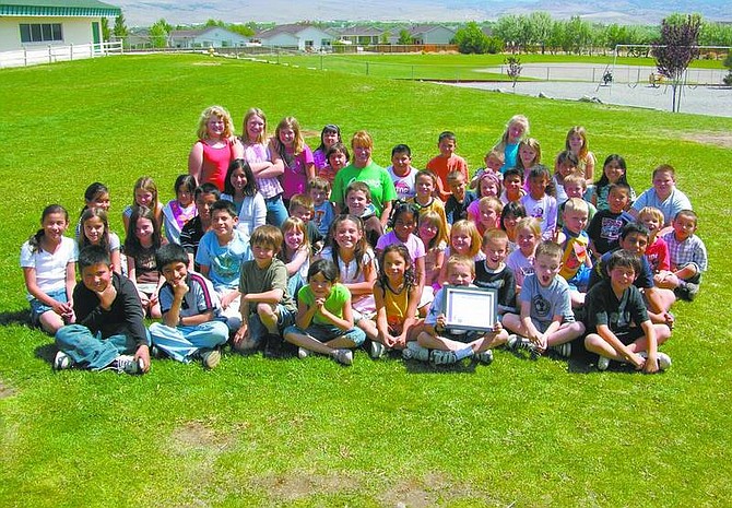 By Karel C. Ancona-Henry/Nevada Appeal Sutro Elementary School first- and fourth- graders donated to Curves Dayton&#039;s Relay for Life.