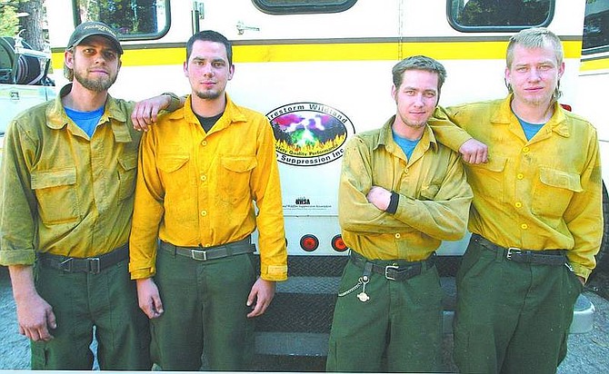 Dan Thrift/Nevada appeal news Service The Gray brothers, from left, Isaiah, Odin, Eli and Thor work together for Firestorm Wildland Fire Suppression Inc.