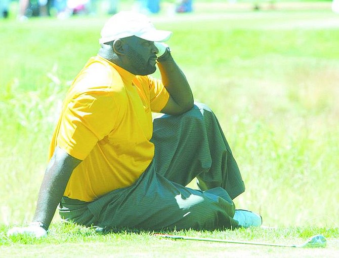 Dan Thrift / Tahoe Daily Tribune Lawrence Taylor takes a seat in jest while his long bio is read before teeing off Thursday during the American Century Championship Celebrity-Am at Edgewood Tahoe Golf Course.