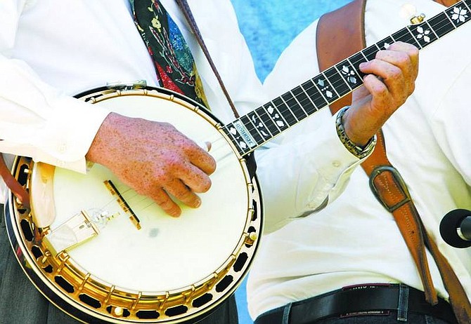 Nevada Appeal File Photo Gorge Goodell, a banjo player for Carolina Special, lets his fingers do the talking at the 2005 Bluegrass on the Comstock held in Virginia City.