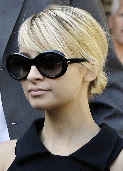 Nicole Richie departs the courthouse in Glendale, Calif., Friday, July 27, 2007. Richie pleaded guilty Friday to driving under the influence of drugs and was sentenced to 90 hours in jail and fined $2,048 by a judge who said she was lucky nobody was killed when she drove the wrong way on a freeway.   (AP Photo/Nick Ut)