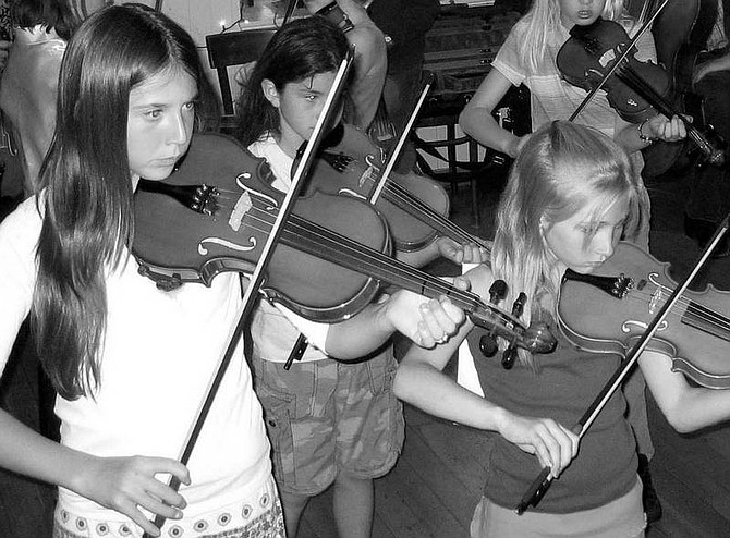 Photo submitted  &quot;Strings in the Summer&quot; students Hanna Fasiang, Kacey Lopes and Kyra Mammen.