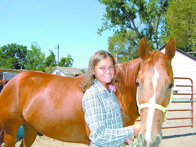 Mary Jean Kelso/Nevada Appeal News Service Sierra Arroyo, 12, a member of the Nevada Quarter Horse Youth Association, shows her registered quarter horse, Twila (War Leo Twila), at exhibitions throughout Nevada and is involved in competitions as far away as Texas.