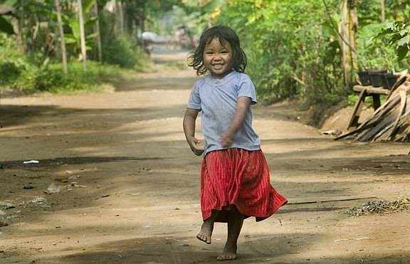 A Pangandaran girl whose spirit the photographer said he watched  ascend, &quot;from the depths of that disease, over the garbage, the sewage, the corruption, the poverty.&quot;