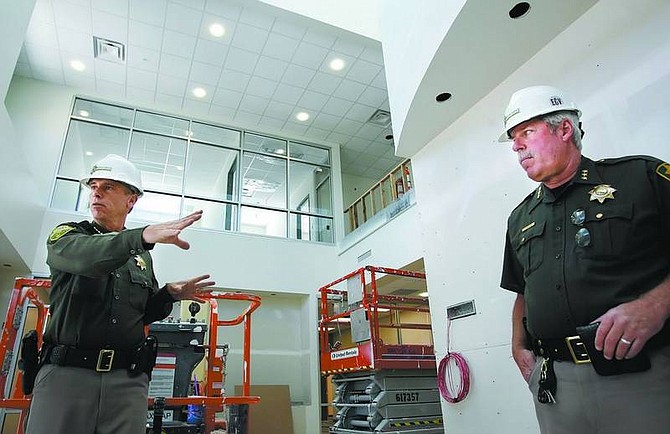 Carson City Sheriff Kenny Furlong, left, and Undersheriff Steve Albertsen, talk about current construction progress on the new Sheriff&#039;s Administrative Building on Monday.