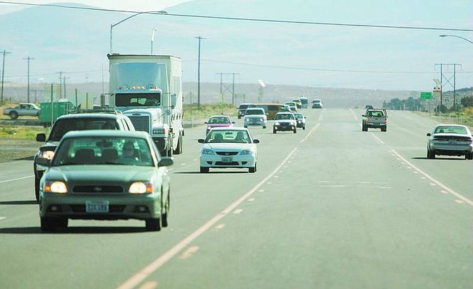 BRAD HORN/Nevada Appeal Commuters travel west on Highway 50 through Mound House on Thursday morning.