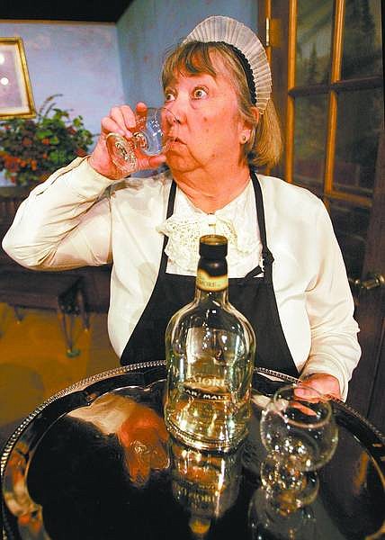 photos by Cathleen Allison/Nevada Appeal Jonni Moon rehearses as Edith the maid Tuesday night at the Brewery Arts Center. Proscenium Players, Inc. presents Blithe Spirit, which opens Friday.