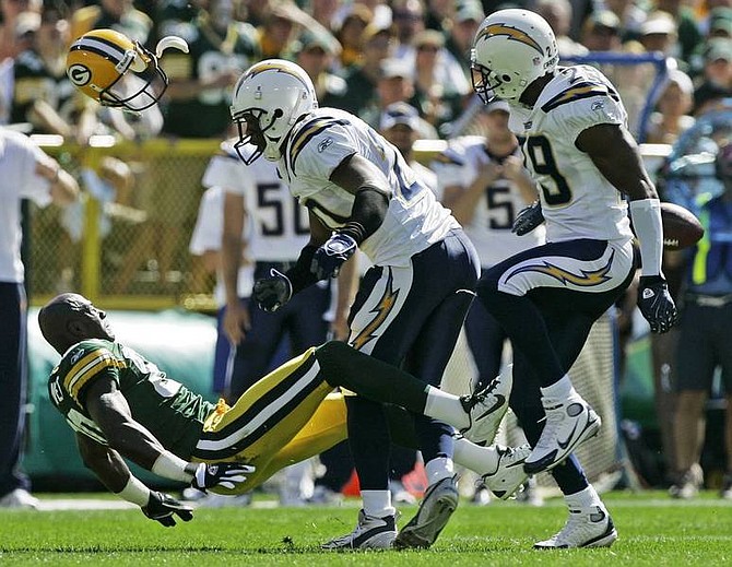 Morry Gash/Associated Press Green Bay Packers wide receiver Donald Driver (80) loses his helmet as he is hit by San Diego Chargers safety Marlon McCree (20) during the first half of Sunday&#039;s game in Green Bay, Wis. McCree was called for a personal foul on the play.