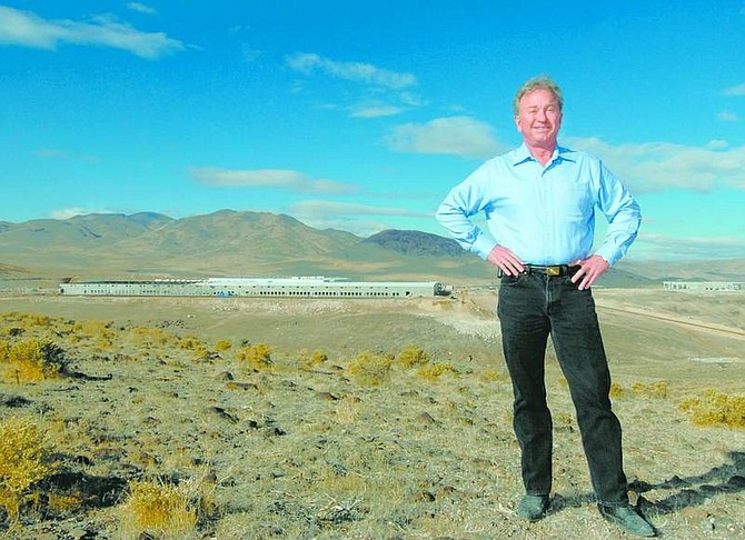 Kevin Clifford/Nevada Appeal Roger Norman, owner of the Tahoe-Reno Industrial Center, stands in front of the new PetSmart distribution center, left, which is nearly 900,000 square feet and will be the second biggest building in the industrial park.