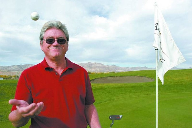Trevor Clark/Nevada Appeal Dennis Stark, the new Lyon County Manager, poses for a portrait on the golf course next to his home in Yerington.