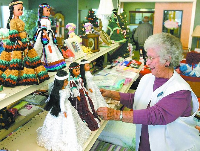 Cathleen Allison/Nevada Appeal Dorothy Crosby, manager of the gift shop at the Carson City Senior Citizen Center, said Saturday&#039;s Santa&#039;s Village fundraiser offers many handcrafted items from local seniors.