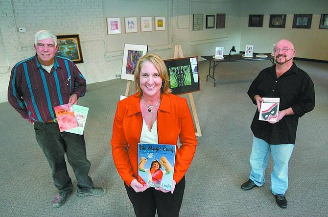 Cathleen Allison/Nevada Appeal Carson City authors Dennis Cassinelli, Valerie Kneefel and Marshall Brodeur participated in a book launching for Box Sled Publishing and art exhibit reception at the Capital City Arts Initiative gallery.