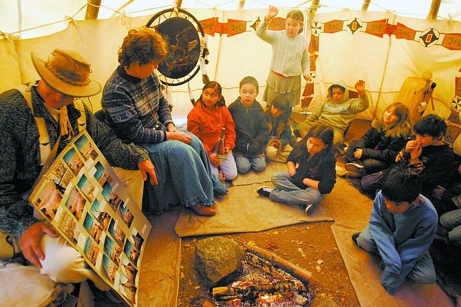 BRAD HORN/Nevada Appeal Amy Oden&#039;s third grade class learns about the construction of tepees in Bonnie and Jon Springmeyer&#039;s tepee at Fremont Elementary School on Wednesday.