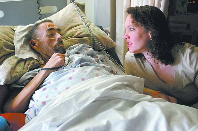 Cathleen Allison/Nevada Appeal Bill Colonna, a former chaplain with the Carson City Sheriff&#039;s Department, talks Tuesday with his wife Shelly. Colonna, who has been hospitalized since February, is dying from complications of diabetes.