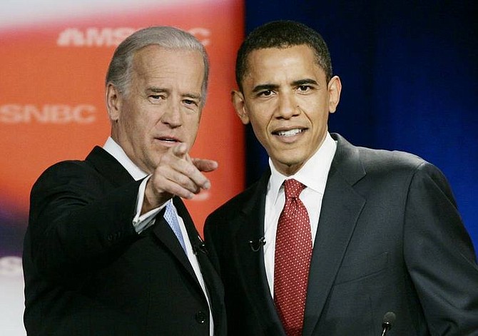 (AP Photo/J. Scott Applewhite, File)Sen. Joe Biden, D-Del., left, talks with Sen. Barack Obama, D-Ill., prior to the start of the first Democratic presidential primary debate of the 2008 election hosted by the South Carolina State University in Orangeburg, SC.,  in this April 26, 2007 file photo.  Barack Obama selected Sen. Joe Biden of Delaware late Friday night Aug. 22, 2008  to be his vice presidential running mate, according to a Democratic official, balancing his ticket with an older congressional veteran well-versed in foreign and defense issues.