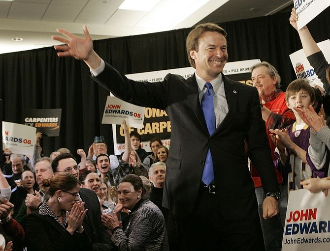 Democratic presidential hopeful and former Sen. John Edwards, D-N.C., campaigns at the carpenters&#039; union hall Tuesday, Jan. 29, 2008, in St. Paul, Minn.  (AP Photo/Jim Mone)