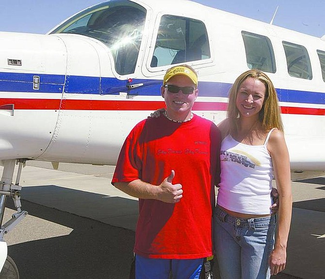 Sarah Hall /Nevada Appeal News Service Co-owners of Skydive Tahoe, Wes Harberts and Aja Niemann, are seen in August soon after opening their skydiving business at Minden-Tahoe Airport in Minden. Harberts died Sunday in a skydiving accident near the airport.