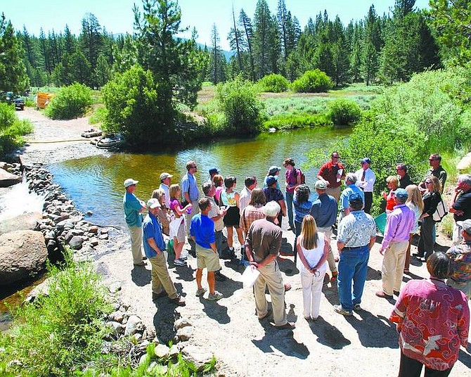 Jim Grant / Tahoe Daily Tribune Government and agency officials gather at the low-water crossing of the Upper Truckee River on Thursday morning before a groundbreaking ceremony for the city&#039;s river restoration project.