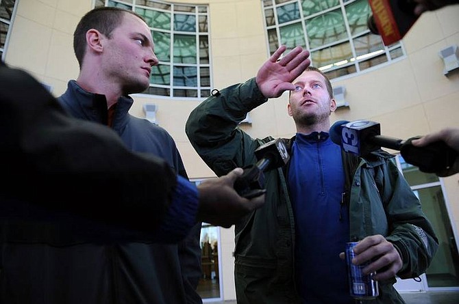 Hector Amezcua/The Sacramento Bee Patrick Frost, 35, right talks to media on Monday as his friend Christopher Gerwig, 32, left, listens in front of the Auburn sheriffs department. The San Francisco friends were airlifted to Auburn because weather conditions made it difficult to fly to Tahoe-Truckee Airport, officials said. They had medical checkups before meeting family members.