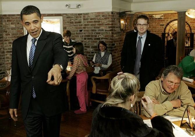 AP Photo/Charles Rex ArbogastDemocratic presidential hopeful Sen. Barack Obama, D-Ill., campaigns in Harper&#039;s Restaurant in Columbia, S.C., Saturday. Obama is projected to win the primary.