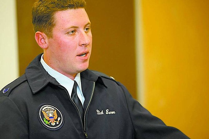Shannon Litz/Nevada Appeal News Service Douglas High School class of 2000 graduate Nick Baron talks about working on Air Force One and his military career to the Douglas County Sheriff&#039;s Office Explorers on June 10.