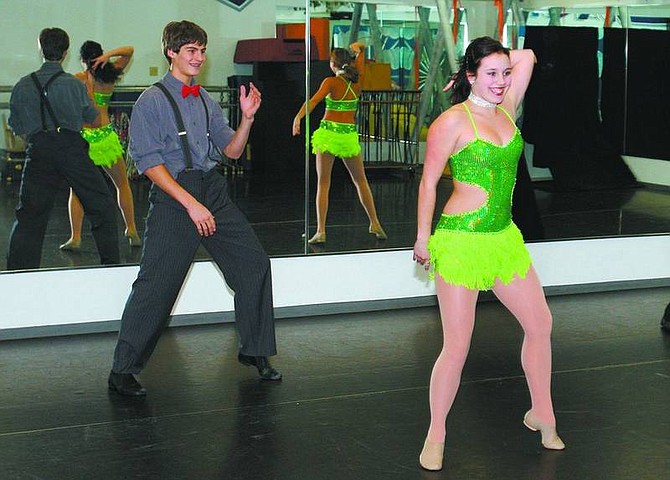 Jim Grant/Nevada Appeal News Service Kevin Novotny and  Jessica Shull rehearse Wednesday at South Lake Tahoe&#039;s Dance Visions Performing Arts Centre. They&#039;re part of a quartet who will be competing in March in Barcelona, Spain.