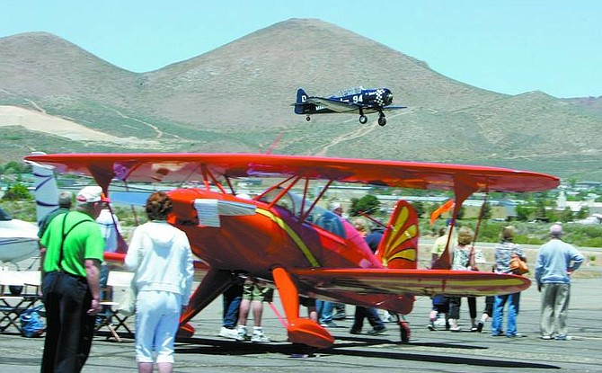 BRAD HORN/Nevada Appeal Spectators look at planes at the Carson City Airport on Saturday during the &#039;Wings Over Carson&#039; open house event.