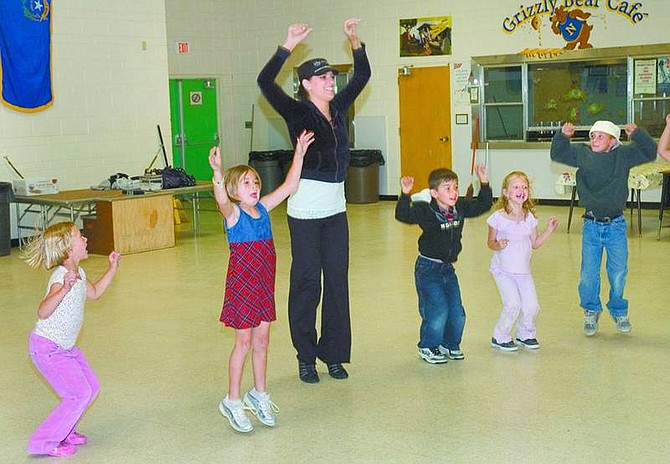 Steve Ranson/Nevada Appeal News Service Miss Carson City, Julianna Erdesz, second from left, spent one day in Fallon last week teaching dance and creative movement to local elementary students.
