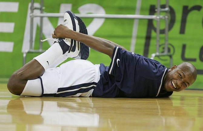 Photo by Brad HornNevada&#039;s Armon Johnson stretches before the beginning of the Wolf Pack&#039;s game against San Jose State at Lawlor Events Center on Thursday.