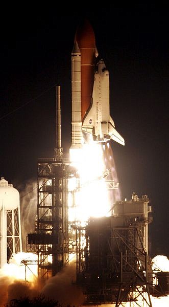 Space shuttle Endeavour lifts off from pad 39A at the Kennedy Space Center, Fla., Tuesday. Endeavour&#039;s seven-man crew will deliver the first section of Japan&#039;s lab and Canada&#039;s two-armed robotic system to the International Space Station.