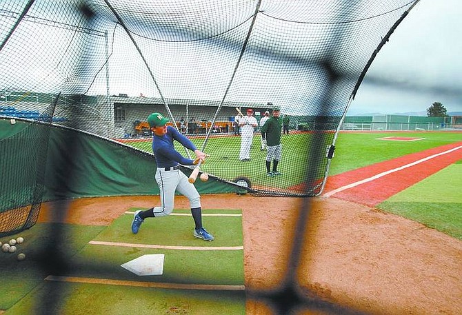 Cathleen Allison/Nevada Appeal Colt Dotson takes batting practice Tuesday afternoon during the Nevada Bighorns practice at Western Nevada College.
