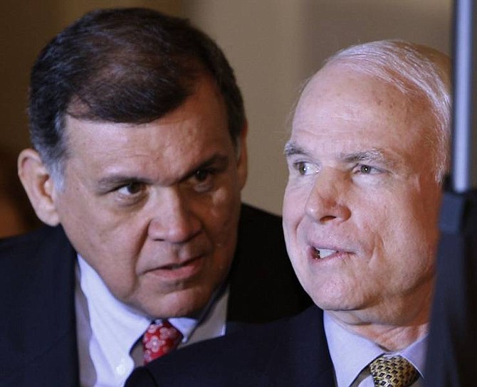 Charles Dharapak/Associated Press Republican presidential hopeful, Sen. John McCain, R-Ariz., and Sen. Mel Martinez, R-Fla., talk off stage before Martinez announced his endorsement for McCain during a campaign appearance at the Latin Builders Association, Inc., conference in Miami, Fla., Friday.