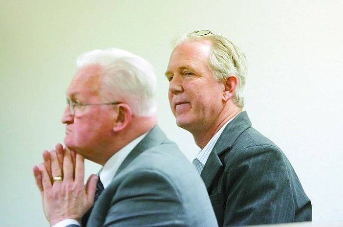 BRAD HORN/Nevada Appeal Eric Pierson, right, and his attorney William O&#039;Mara listen to the prosecutor speak in Virginia City Justice Court on Friday. Pierson is charged with two counts of sexual assault and one count of attempted sexual assault.