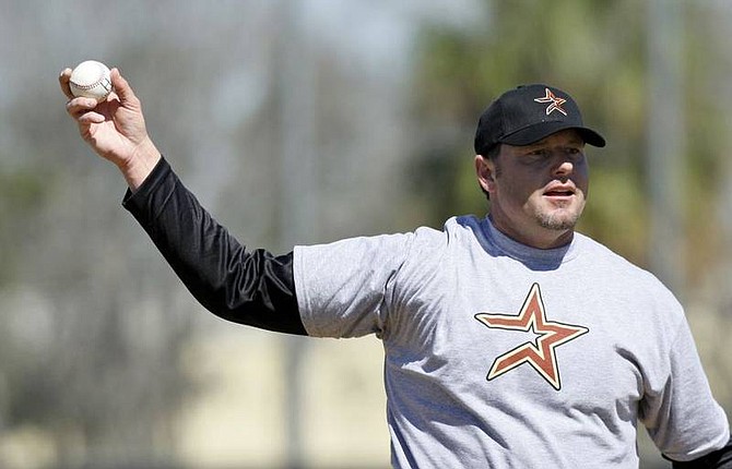 AP Photo/David J. PhillipRoger Clemens throws a pitch during batting practice with minor leaguers at the Houston Astros spring training facility Thursday in Kissimmee, Fla. Congress has asked the Justice Department to investigate whether Roger Clemens &quot;committed perjury and made knowingly false statements&quot; to a House committee.