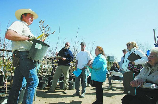 BRAD HORN/Nevada Appeal Greenhouse Garden Center owner Dave Ruf speaks during a seminar about spring gardening at the Carson City store on Saturday.