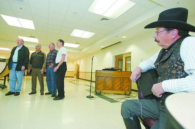 BRAD HORN/Nevada Appeal Cliff Ott, of Dayton, watches auditions for the upcoming Senior Follies at the Carson City Senior Citizens Center. Ott is performing cowboy poetry for the show.