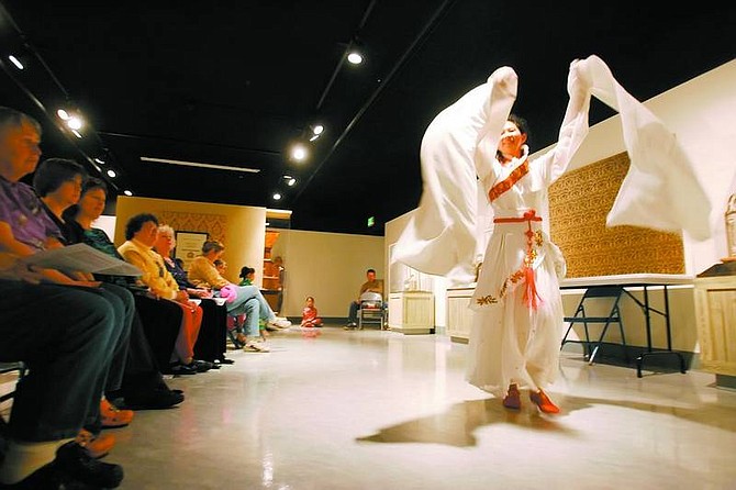 BRAD HORN/Nevada Appeal Xian Na (Sonia) Carlson performs during &#039;Power and Grace: Sonia Carlson presents Chinese Dance and Culture&#039; at the Nevada State Museum on Saturday.