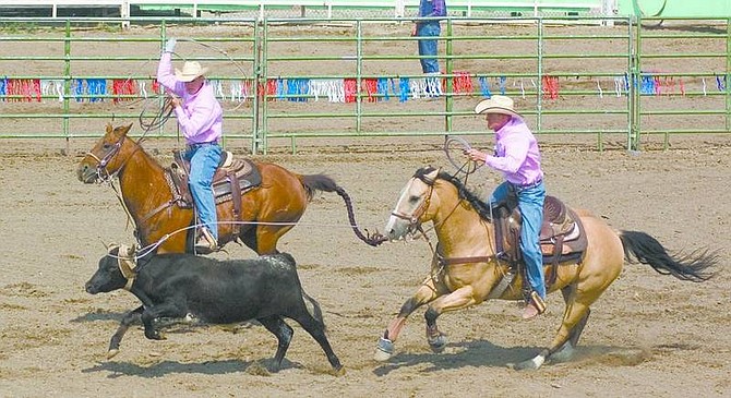 Larry Barker/nevada appeal news service Utah twins Justin, left, and Jordan Platt attempt to rope a steer this week during the Silver State International Rodeo in Fallon. The 23rd annual rodeo concludes at 6 p.m. today at the Churchill County Fairgrounds.