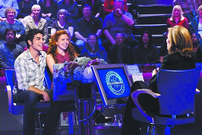 Photo courtesy of Valleycrest Productions Ltd. Engaged couple Nick Aliberti, left, and Sierra Scott, center, are shown during a taping of &quot;Wedding Week&quot; on Who Wants to be a Millionaire. Scott, from Carson City, and Aliberti will be on Monday and Tuesday&#039;s shows, airing at 7 p.m. on ABC.