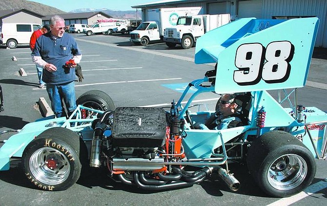 Rhonda Costa-Landers/Nevada Appeal Steve Shaw, in blue shirt at left, and Tom Silsby, sitting in racecar, owners of S&amp;S Motorsports, check out the No. 98 after firing off the engine Saturday in preparation for the 2008 Supermodified Racing Association season. Five teams from Northern Nevada will open their season April 5 at Madera Speedway in Madera, Calif.