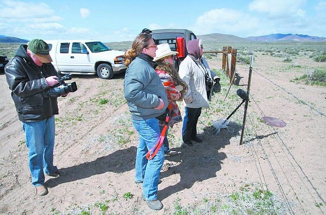 Cathleen Allison/Nevada Appeal Photographer Gabi Gumpert films Antonia Umlauf Baroness von Lamatsch, of Austria, as she and Lacy J. Dalton and Sharon DeCarlo look for a herd of wild horses in Silver Springs on Tuesday morning. The crew was in town to shoot a documentary about wild horses for future release.