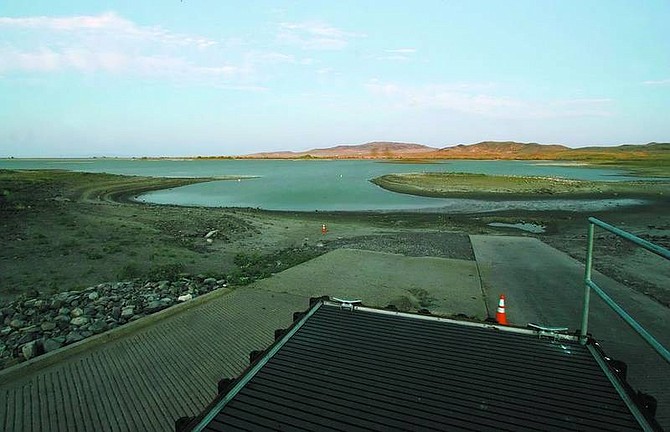 BRAD HORN/Nevada AppealLahontan Reservoir&#039;s low levels are seen here at a dock on Friday. Boaters and waterskiers have been advised not to use the reservoir, where low levels will probably have a significant impact on irrigation this year.
