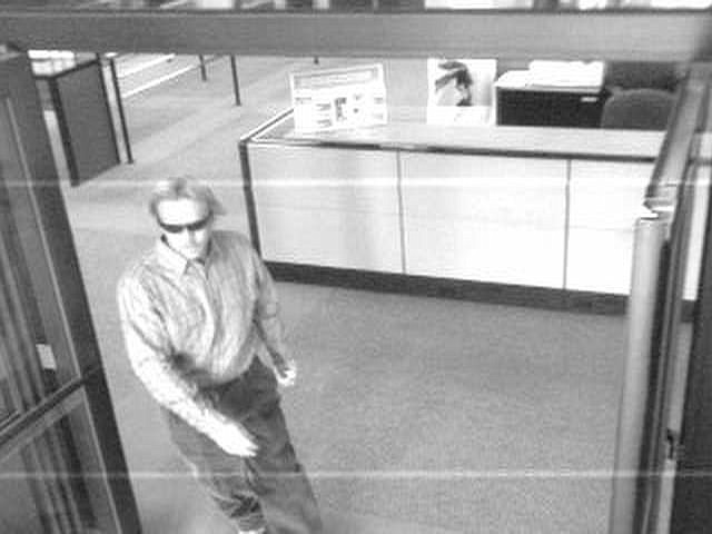 Surveillance photograph of a man who robbed a Reno bank this afternoon.