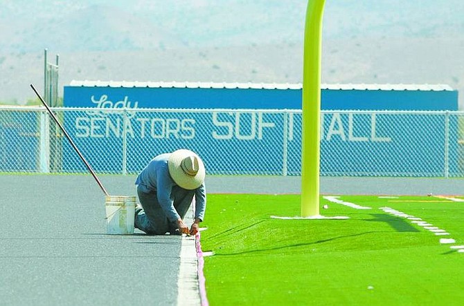 BRAD HORN/Nevada AppealThe track at Carson High School is being resurfaced as part of the $25 million bond issue passed in 2006. For the first time in four years, the track teams will be able to host home meets.