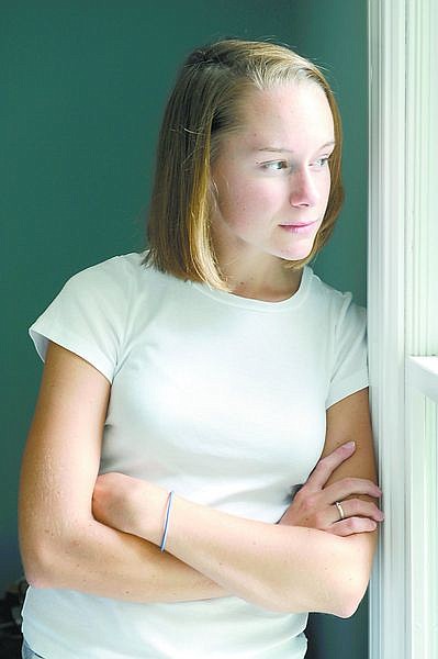 Megan Donovan, 18, of Alexandria, Va., lost her father, Navy Cmdr. William Donovan in the 2001 Pentagon attack. &quot;The biggest thing,&quot; the Wake Forest University freshman says, &quot;was that I have had to grow up a lot faster than kids my age.&quot; Illustrates SEPT11-KIDS (category a), by Donna St. George (c) 2008, The Washington Post. Moved Wednesday, Sept. 10, 2008. (MUST CREDIT: Washington Post photo by Marvin Joseph.)