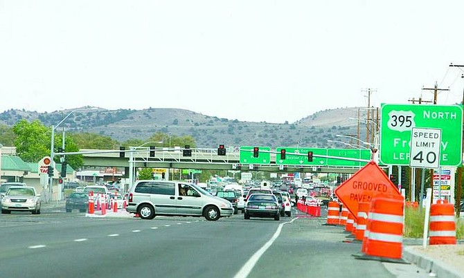 Brad Horn/Nevada AppealConstruction near the Highway 50 East overpass is expected to be completed by Wednesday. Motorists can expect delays beginning today through Monday as the final layer of asphalt is laid. Construction should be complete by the middle of next week.
