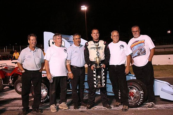 Rhonda Costa/Nevada AppealThe S&amp;S Motorsports team including driver Troy Regier, center with trophy, celebrates in Winner&#039;s Circle Saturday at Madera Speedway in Madera, Calif. after winning the Annual Harvest Classic.