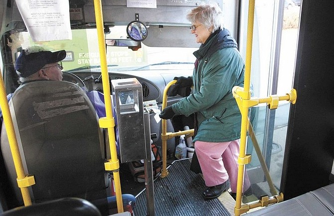 Cathleen Allison/Nevada AppealNorma Wohlt boards a JAC bus Tuesday afternoon at Washington and Plaza streets. The city offers free bus passes to senior citizens, which Wohlt says, &quot;I couldn&#039;t do without it.&quot;